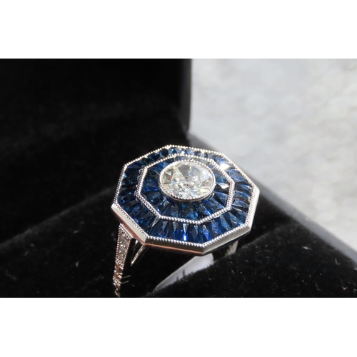 41 - Diamond and Sapphire Panel Set Ring Octagonal Form Centre Diamond 0.96 Carat Finely Incised Detailin... 