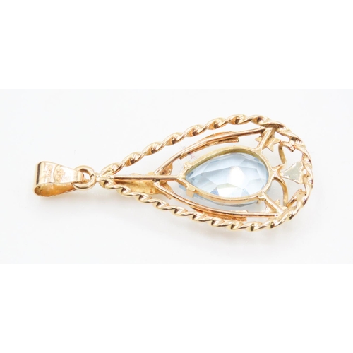 423 - Aquamarine Set Tear Drop Pendant Set in 18 Carat Yellow Gold with Rope Form Detailing 5cm high