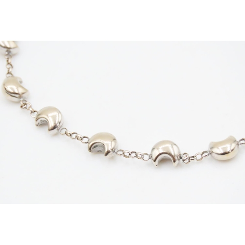 425 - 18 Carat White Gold Moon Motif Bracelet 18.5cm Long