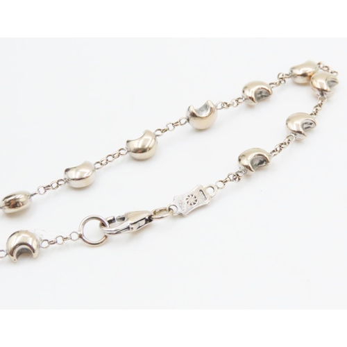 425 - 18 Carat White Gold Moon Motif Bracelet 18.5cm Long