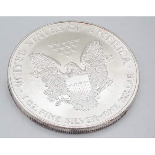 440 - One Ounce 999.9 Fine Silver Dollar Coin