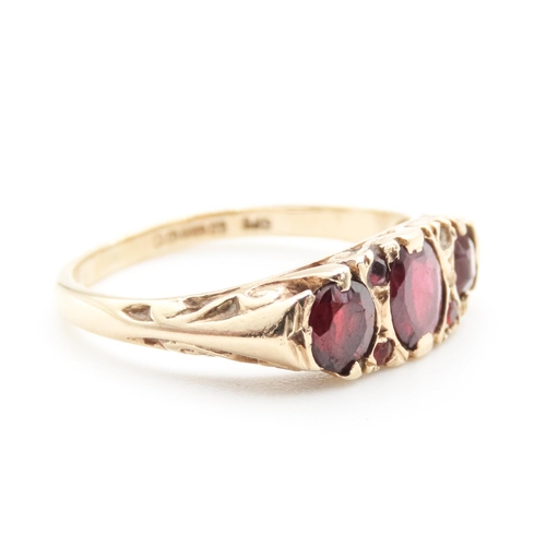 45 - Three Stone Red Garnet Ring Set in 9 Carat Yellow Gold with Further Garnet Decoration to Settings Ri... 