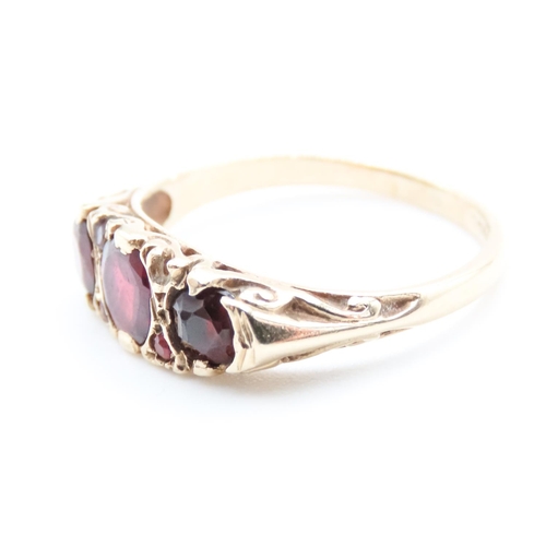 45 - Three Stone Red Garnet Ring Set in 9 Carat Yellow Gold with Further Garnet Decoration to Settings Ri... 