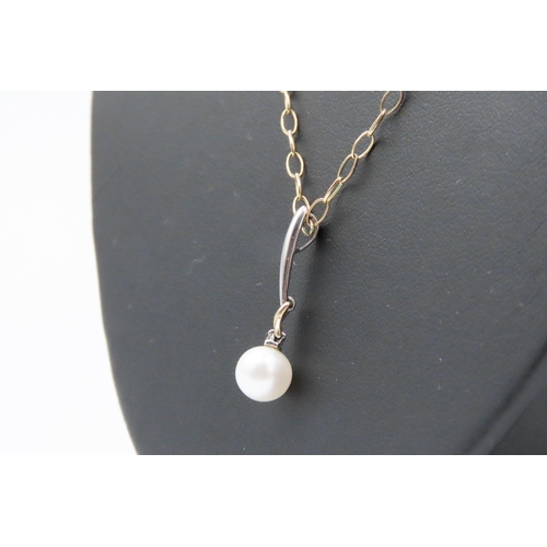 450 - 14 Carat Yellow and White Gold Pearl Set Pendant 3cm Drop Further Set on 9 Carat Yellow Gold Chain 4... 