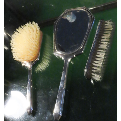 562 - Three Piece Silver Dressing Set Hand Mirror Hair Brush and Clothes Brush Hallmarked