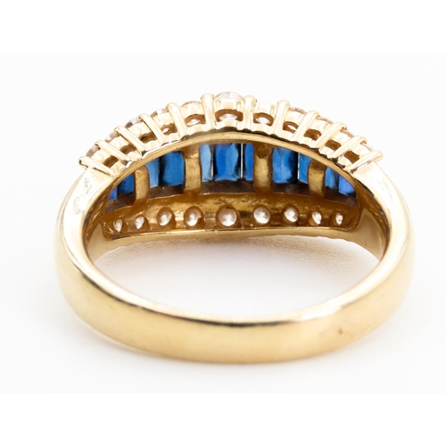 77 - Three Row Baguette Cut Sapphire and Gradual Diamond Set Ring Mounted in 18 Carat Yellow Gold Ring Si... 