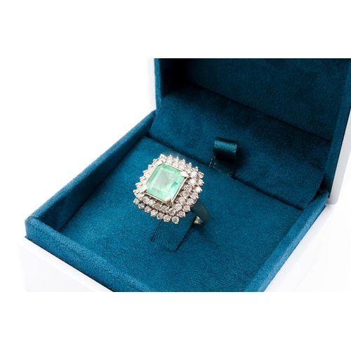 84 - Emerald Centre Stone Ring with Diamond Set Twin  Halo Surround Mounted in 18 Carat White Gold Ring S... 