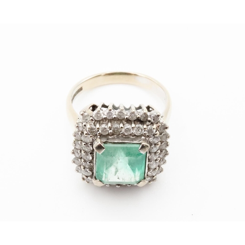 84 - Emerald Centre Stone Ring with Diamond Set Twin  Halo Surround Mounted in 18 Carat White Gold Ring S... 