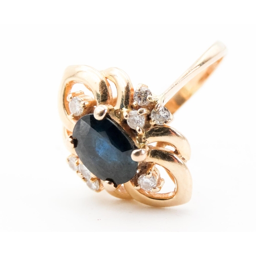 89 - Attractively Set Sapphire and Diamond Ring Set in 14 Carat Yellow Gold Ring Size L and a Half