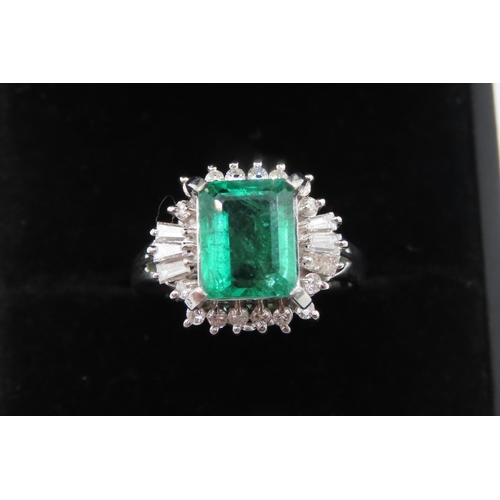 21 - Emerald Centerstone Ring with Round and Tapered Baguette Cut Diamond Halo Set in Platinum Total Emer... 