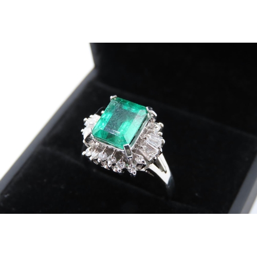 21 - Emerald Centerstone Ring with Round and Tapered Baguette Cut Diamond Halo Set in Platinum Total Emer... 