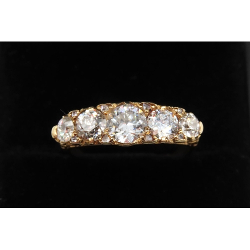 23 - Ladies Five Stone Diamond Ring Finely Detailed Basket Setting Mounted in 18 Carat Yellow Gold Total ... 