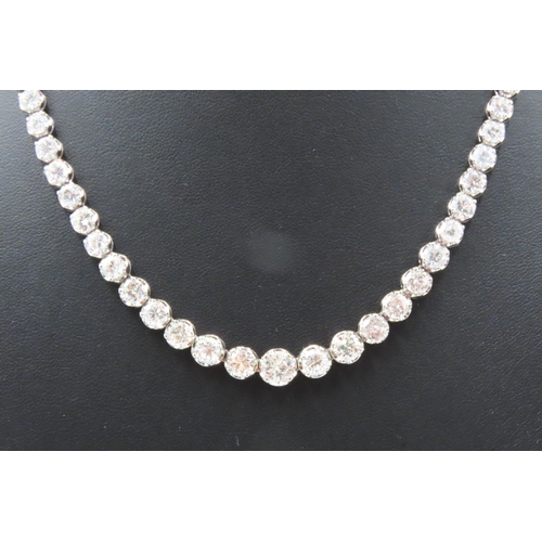 25 - Attractively Set Ladies Graduated Form Diamond Riviere Articulated  Necklace Mounted in Platinum 42c... 