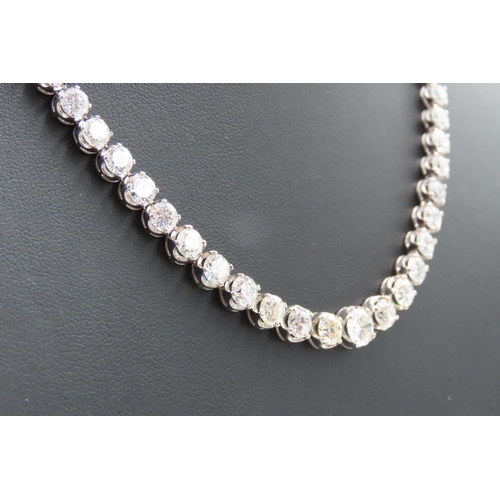 25 - Attractively Set Ladies Graduated Form Diamond Riviere Articulated  Necklace Mounted in Platinum 42c... 