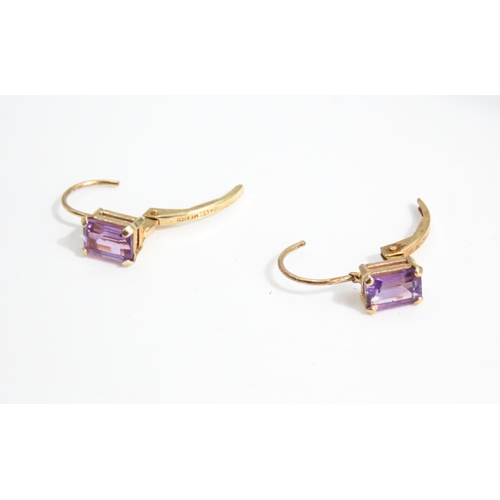 31 - Pair of Emerald Cut Amethyst Set Earrings Mounted in 9 Carat Yellow Gold 1.5cm High