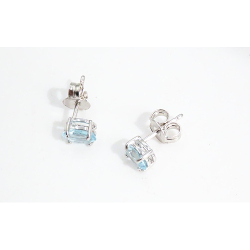 35 - Pair of Oval Cut Aquamarine Set Ladies Earrings Mounted in 9 Carat White Gold 5mm High