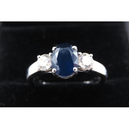 42 - Sapphire and Diamond Set Ladies Three Stone Ring Mounted in 18 Carat White Gold Ring Size N