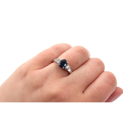 42 - Sapphire and Diamond Set Ladies Three Stone Ring Mounted in 18 Carat White Gold Ring Size N