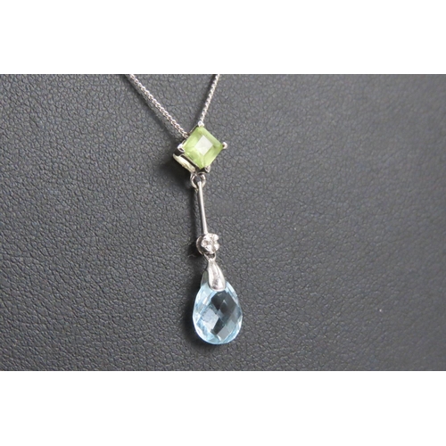 60 - Blue Topaz Peridot and Diamond Set Pendant 9 Carat Yellow Gold Pendant 3cm High Mounted on 9 Carat W... 