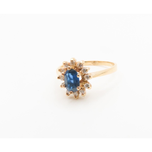 Sapphire Centre Stone Ring Cluster Mounted on 19 Carat Yellow Gold Ring Size M