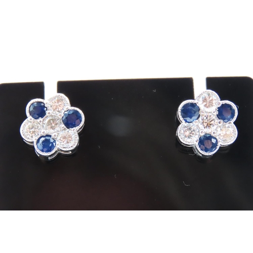 61 - Pair of Sapphire and Diamond Set Daisy Motif Earrings Set in Platinum Total Sapphire Carat Weight 2 ... 