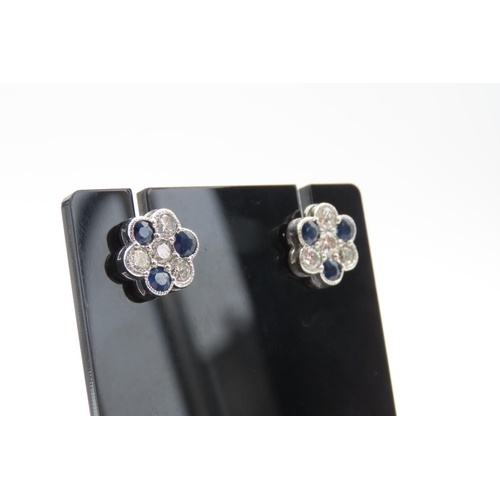 61 - Pair of Sapphire and Diamond Set Daisy Motif Earrings Set in Platinum Total Sapphire Carat Weight 2 ... 