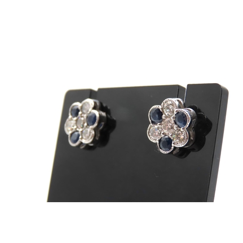 61 - Pair of Sapphire and Diamond Set Daisy Motif Earrings Set in Platinum Total Sapphire Carat Weight 2 ... 