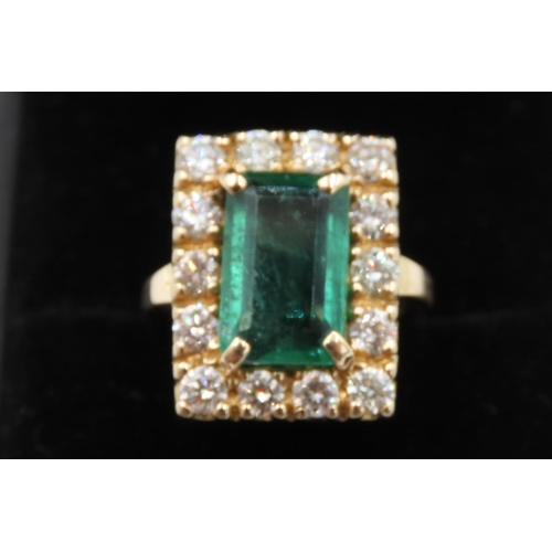 66 - Emerald and Fourteen Diamond Set Ladies Ring Mounted in 18 Carat Yellow Gold Total Emerald Carat Wei... 