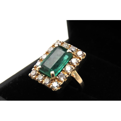 66 - Emerald and Fourteen Diamond Set Ladies Ring Mounted in 18 Carat Yellow Gold Total Emerald Carat Wei... 