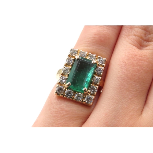 66 - Emerald and Fourteen Diamond Set Ladies Ring Mounted in 18 Carat Yellow Gold Total Emerald Carat Wei... 