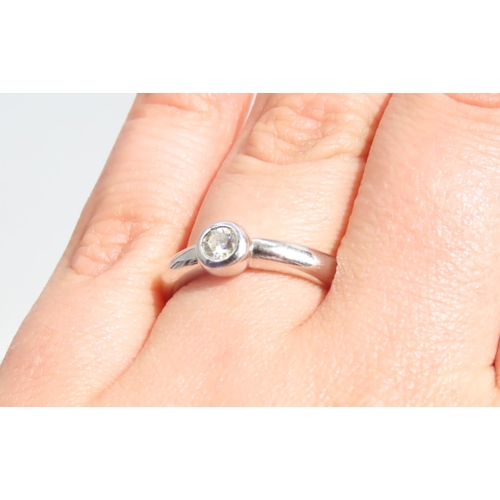 68 - Diamond Solitaire Ring Rub Over Setting Mounted on 9 Carat White Gold Band Ring Size N and A Half