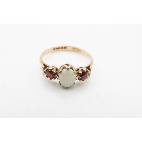 722 - Three Stone Basket Set Garnet and Opal Ring Mounted in 9 Carat Yellow Gold Ring Size N