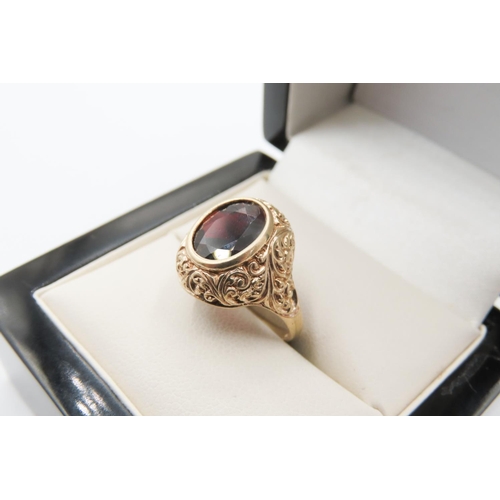 724 - Attractively Detailed Bezel Set Red Garnet Single Stone Ring Mounted in 9 Carat Yellow Gold Ring Siz... 