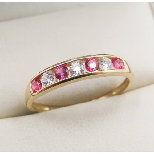 725 - Pink and Clear Gemstone Set Half Eternity Ring Mounted in 9 Carat Yellow Gold Ring Size M