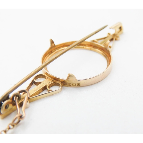 729 - 9 Carat Yellow Gold Half Sovereign Frame Brooch with 9 Carat Yellow Gold Safety Chain  5cm Wide