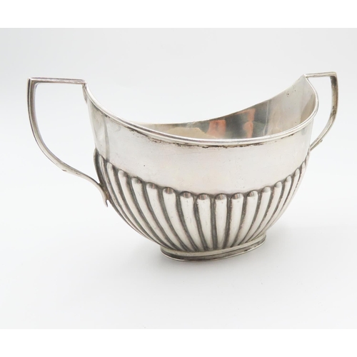 737 - Silver Sugar Bowl  Twin Handle Gadrooned Freeze Decoration 7.5cm by 14cm