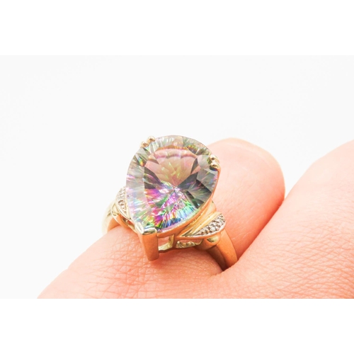 10 - Pear Cut Mystic Topaz Statement Ring with Further Diamonds Set to Shoulders Mounted in 9 Carat Yello... 