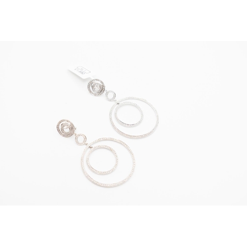 101 - Pair of Diamond Set Circular Form Ladies Dangle Earrings Attractively Detailed Mounted in 18 Carat W... 