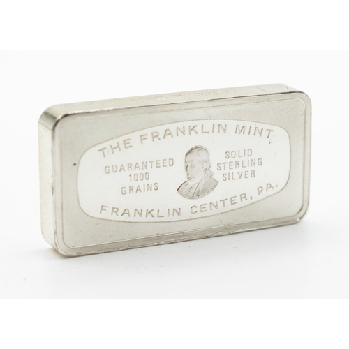 1027 - The Franklin Mint Guaranteed 1000 Grains Solid Sterling Silver Bar Christmas 1975 with Original Pres... 