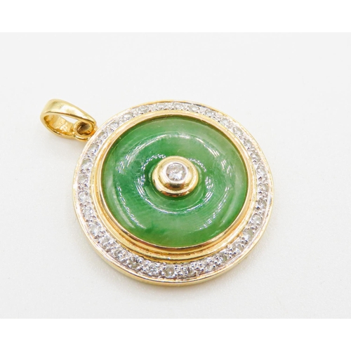109 - Unusual Circular Form Jade Pendant Set in 18 Carat Yellow Gold with Diamond Surround Total Diamond C... 