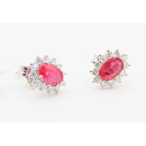 117 - Pair of Ruby and Diamond Set  Cluster Earrings Mounted in 18 Carat White Gold Ruby of High Color Eac... 