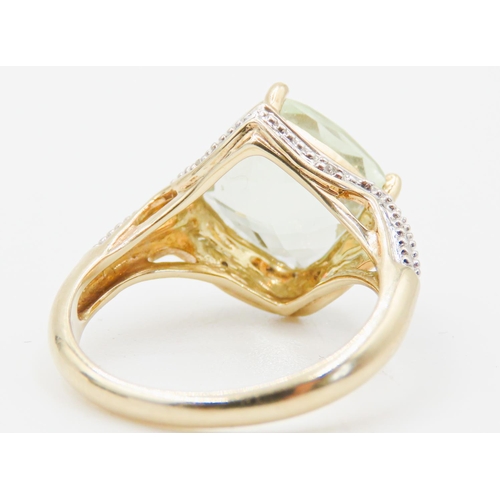 123 - Facet Cut Green Prasiolite Single Stone Ring Mounted in 9 Carat Yellow Gold Further Diamond Inset to... 