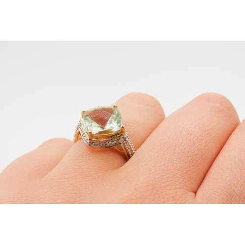 123 - Facet Cut Green Prasiolite Single Stone Ring Mounted in 9 Carat Yellow Gold Further Diamond Inset to... 