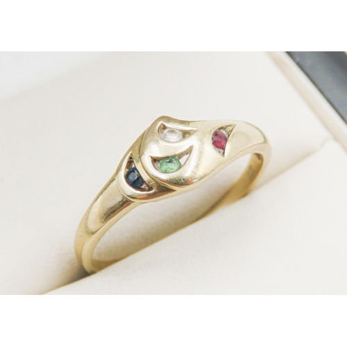 124 - Sapphire Ruby Emerald and White Topaz Set Ring Mounted in 8 Carat Yellow Gold Ring Size O and a Half