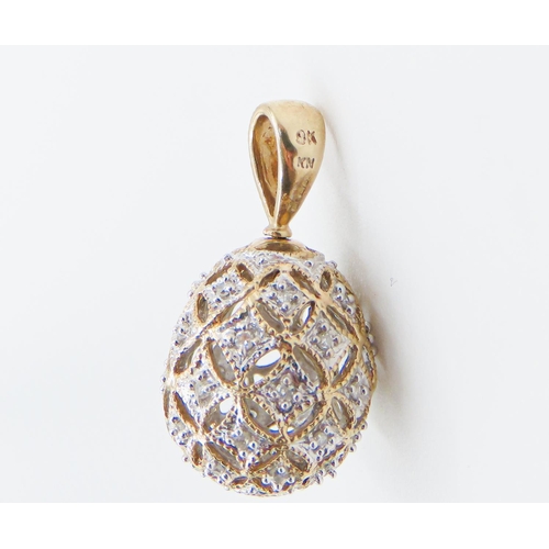 134 - Matching 9 Carat Yellow Gold Diamond Set Egg Form Pendant 2cm High