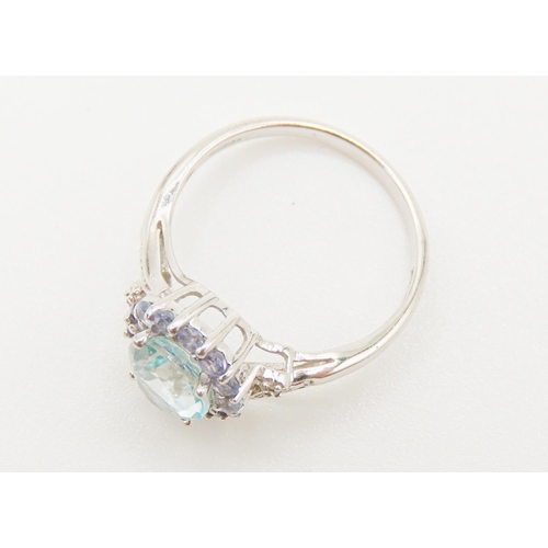 135 - Oval Cut Aquamarine and Pale Amethyst Set Cluster Ring Mounted in 10 Carat White Gold Further Diamon... 