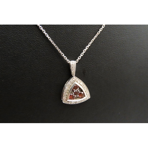 136 - Red Garnet and Diamond Set Triangle Form Pendant Mounted in 9 Carat White Gold 2cm Drop Further Set ... 
