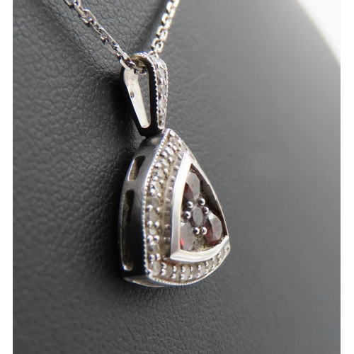 136 - Red Garnet and Diamond Set Triangle Form Pendant Mounted in 9 Carat White Gold 2cm Drop Further Set ... 