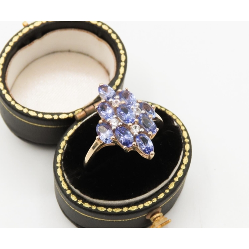 150 - Nine Stone Tanzanite Set Cluster Ring Mounted in 9 Carat Yellow Gold Ring Size Q