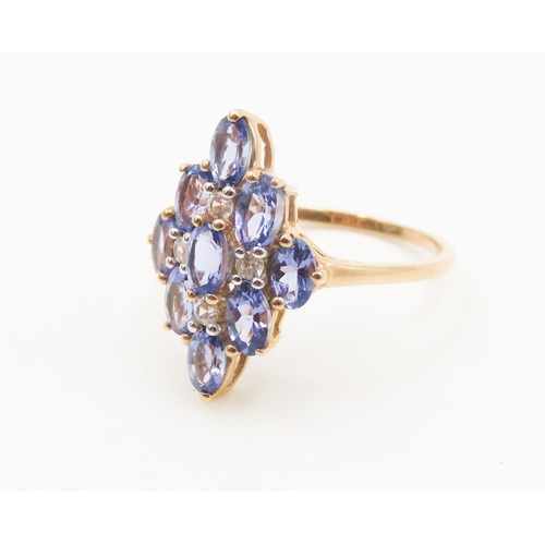 150 - Nine Stone Tanzanite Set Cluster Ring Mounted in 9 Carat Yellow Gold Ring Size Q